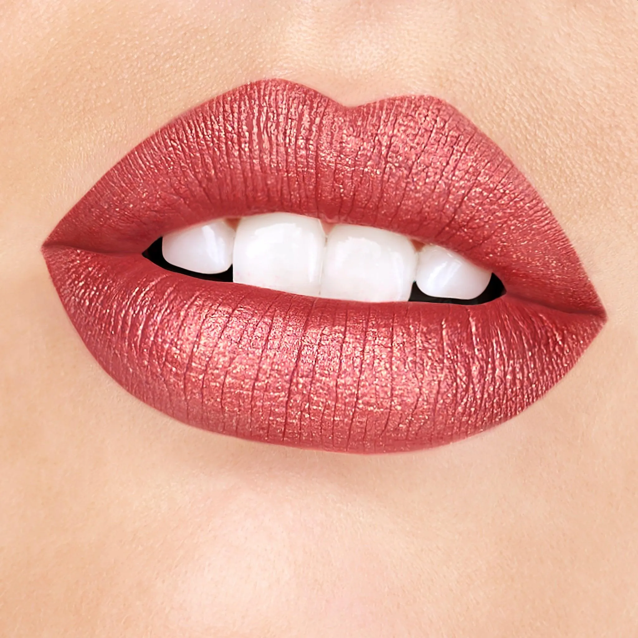 Day Rate  | A Soft Earthy Red With Gold Shimmer Liquid Lipstick